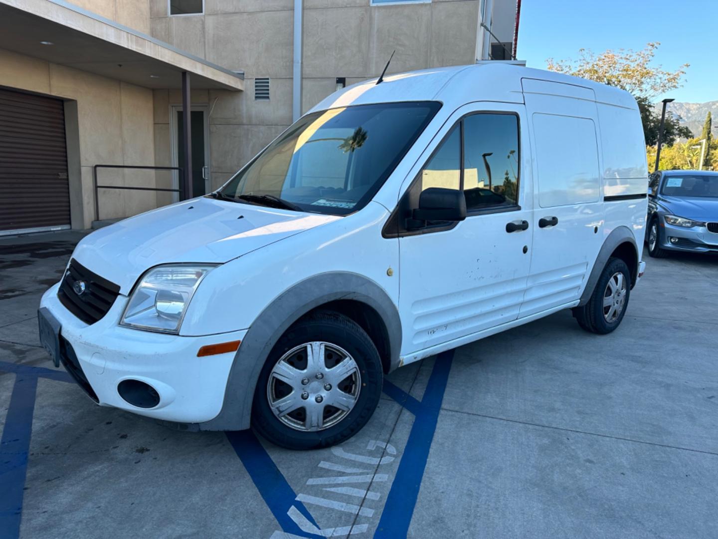 2012 White /Black Ford Transit Connect XLT with Rear Door Glass (NM0LS7BN0CT) with an 2.0L L4 DOHC 16V engine, 4-Speed Automatic transmission, located at 30 S. Berkeley Avenue, Pasadena, CA, 91107, (626) 248-7567, 34.145447, -118.109398 - Great price point for a work van. - Photo#0